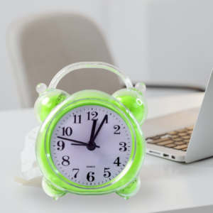 Green transparent quartz alarm clock with white dial and black numerals
